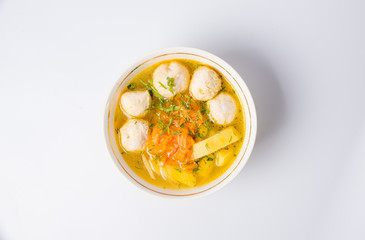 Vegetable soup with meatballs in a tureen