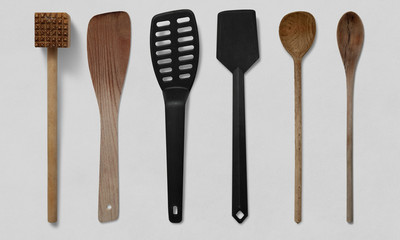 Wooden and Plastic Spoons on a white background