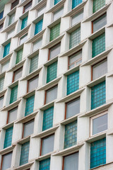 Obraz premium Perspective of green windows. Vertical background. Constructivism. Soviet architecture.