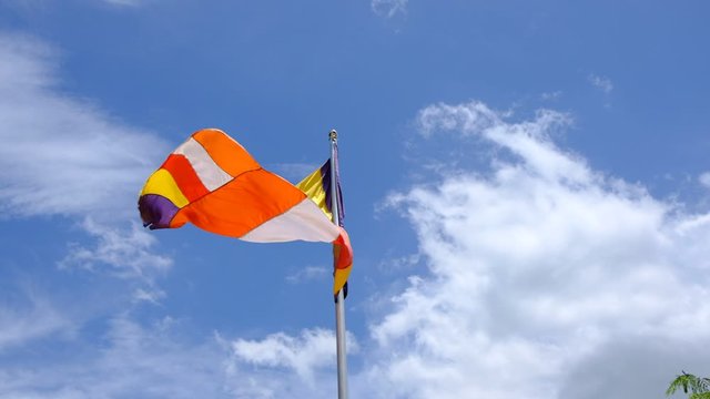 colorful buddhist flags in the wind Sri Lanka slow motion