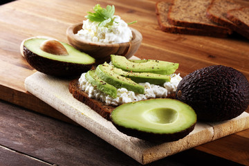 Sandwich with avocado with cream cheese for a healthy breakfast concept