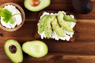 Sandwich with avocado with cream cheese for a healthy breakfast concept