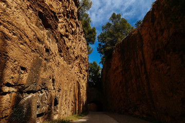 View of the rock from under the cave. Sandy yellow rock.  Rocks. 