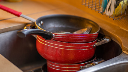 Dirty pots and dishes in dishwasher