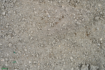 background of loosened dried earth soil ground texture with nothing on it, ready for planting