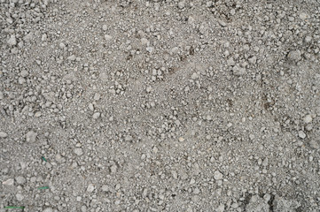 background of loosened dried earth soil ground texture with nothing on it, ready for planting