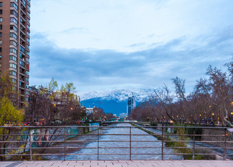 Fototapeta na wymiar Santiago, the capital and largest city in Chile, is located in a valley surrounded by the snowy peaks of the Andes and the Chilean Coastal Range. 