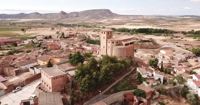 View from drone of Spanish village Cervera de la Canada and church of Santa Tecla, part of the UNESCO World Heritage Site