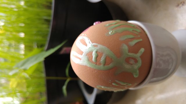 Close Up Of Painted Easter Egg On Cup