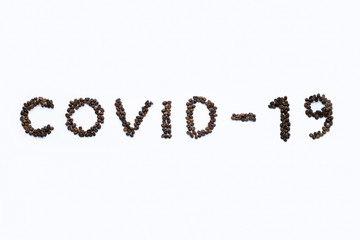 Coffee beans text COVID-19 on white background