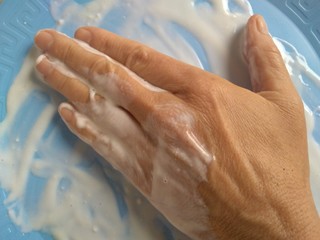 hand with cream