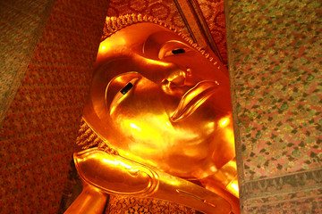 Face of The Big Reclining Buddha, at The Temple of the Reclining Buddha(Wat Pho) Thailand