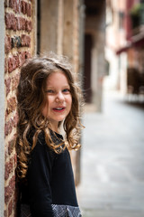 portrait of a cute little girl after the lockdown for coronavirus in Venice Italy