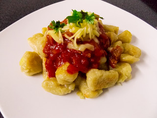 Homemade gnocchi with meat sauce