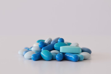 Bunching of blue medicines white background