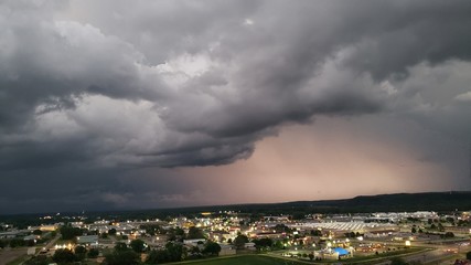 time lapse of clouds over city