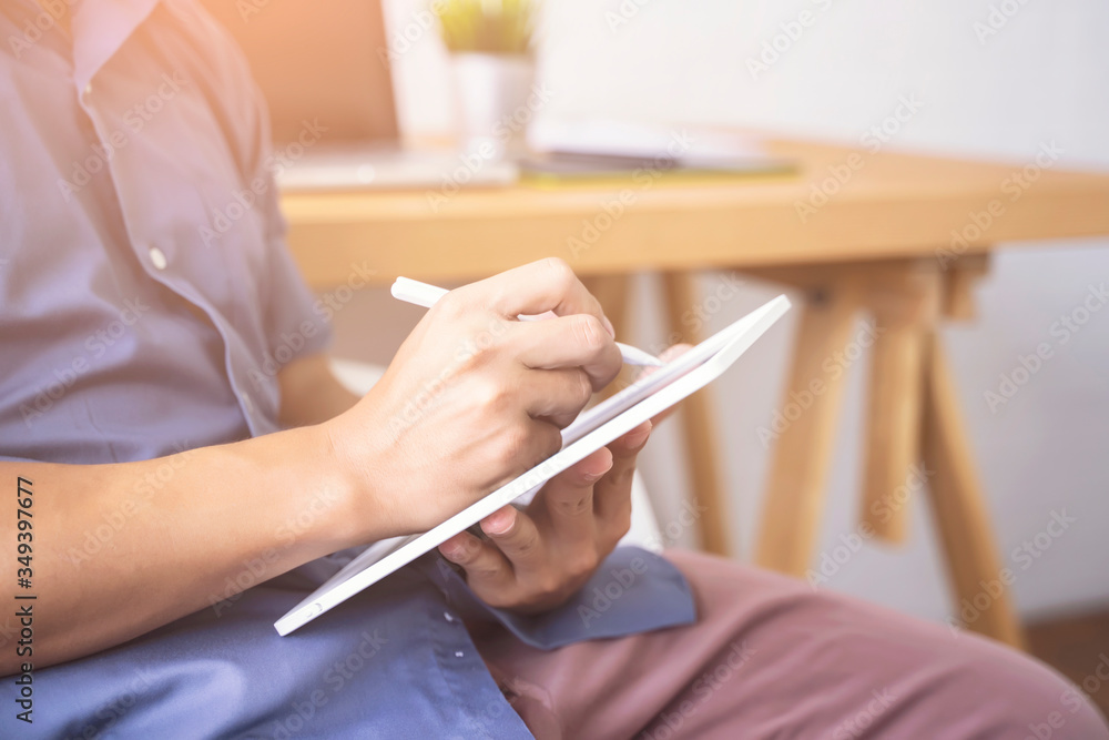 Fototapete Working from home web designing graphical user interface UX UI, close up drawing using tablet device designing creative planning innovative idea, protective facemask quarantine coronavirus covid-19