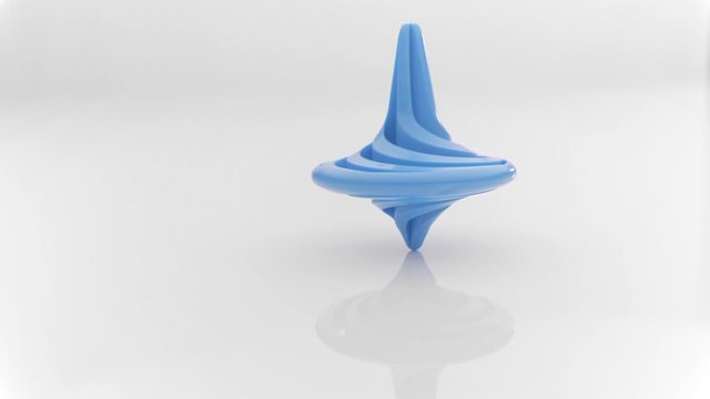 Close up shot of a plastic spinning top moving.