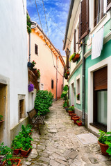Fototapeta na wymiar A narrow street in Buzet, Croatia