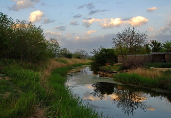 Obraz premium sunset over the river