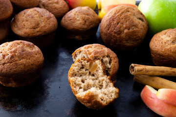 Apple Cinnamon Muffins with apples and cinnamon sticks