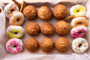 Apple Cinnamon Muffins and donuts with apples and cinnamon sticks