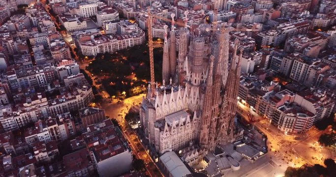 Night aerial cityscape of Barcelona with Sagrada Familia designed by Anthony Gaudi