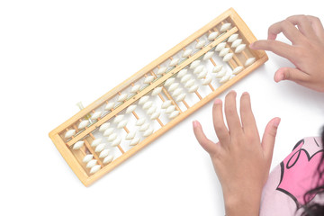 Close up hand is calculating using abacus over white background.