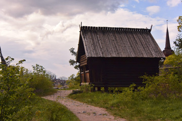 Fototapeta na wymiar 北欧、森の中のストックホルム。 old wooden house and green forest, Stockholm Sweden