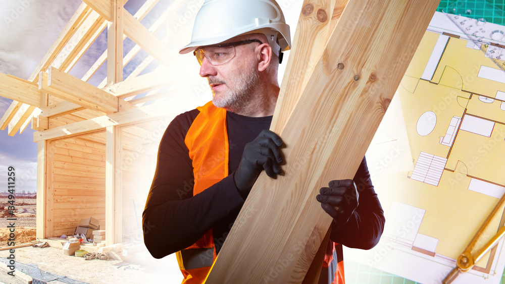 Poster a builder with planks in his hands next to the frame of the cottage.delivery of lumber to the constr