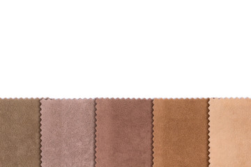 Cut out samples of furniture flock with  isolated on white background in macro. Shaggy fabric for upholstery products in brown and beige. Textile industry of various colors.