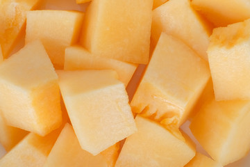 closeup of sliced orange cantaloupe melon for food background