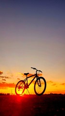 Fototapeta na wymiar bike on sunset