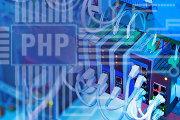 PHP. Personal Home Page. Writing software for servers. Inscription PHP next to the server fragment. Many cables are connected to the equipment. Concept - programming. Software development.
