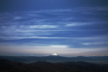 Mt. Fuji and contrail in the sky