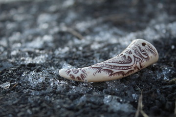 Fang and snow gravel