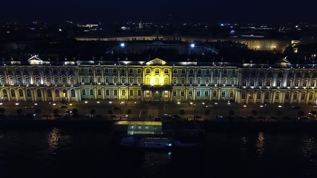 Night Above St. Petersburg, Russia. Drone Aerial View of Illiminated State Hermitage Museum Building and Neva River