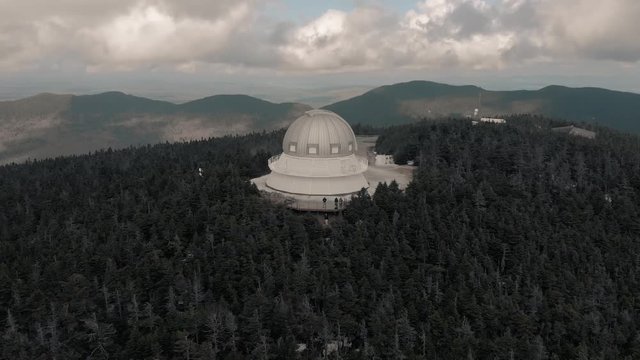 Mont Megantic Observatory Surrounded In Evergreen Forest In Quebec, Canada. - aerial drone shot