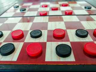 Closeup view of draughts board.