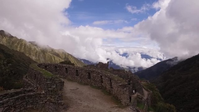 Stone structure, mountains and clouds. Inca trail. Cusco, Peru