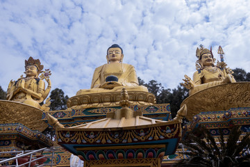 The Golden Buddha Statues in Buddha park, Swayambhunath area, Kathmandu, Nepal, the World Heritage...