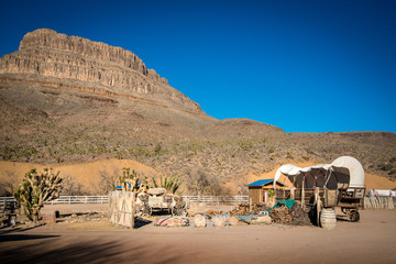 view of the american west with a saddle and a wagon
