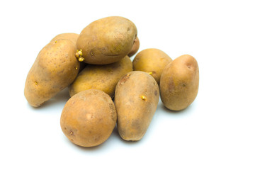 Close up potatoes over white background.