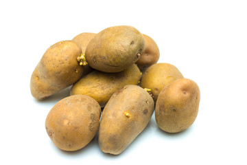 Close up potatoes over white background.