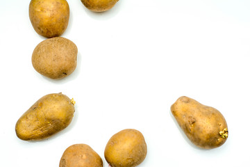Close up potatoes over white background.