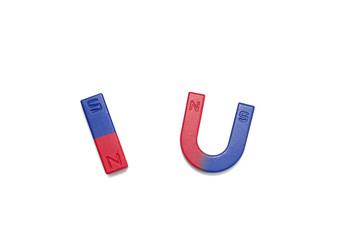 Bar magnet and horseshoe magnet over white background.