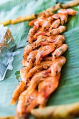 Buttered Shrimp on a banana leaf. Filipino shrimp dish cook with butter and served on a banana leaf