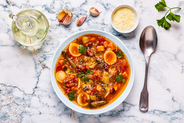 Minestrone, italian vegetable soup with pasta and beans.