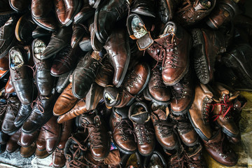 Lots of footwear in the street market. Lots of shoes.