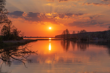 charming landscape on the river at sunset and night time